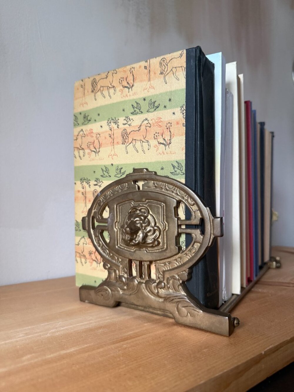 Antique Brass Book Rack | Heraldic Shield Sliding Desktop Bookend